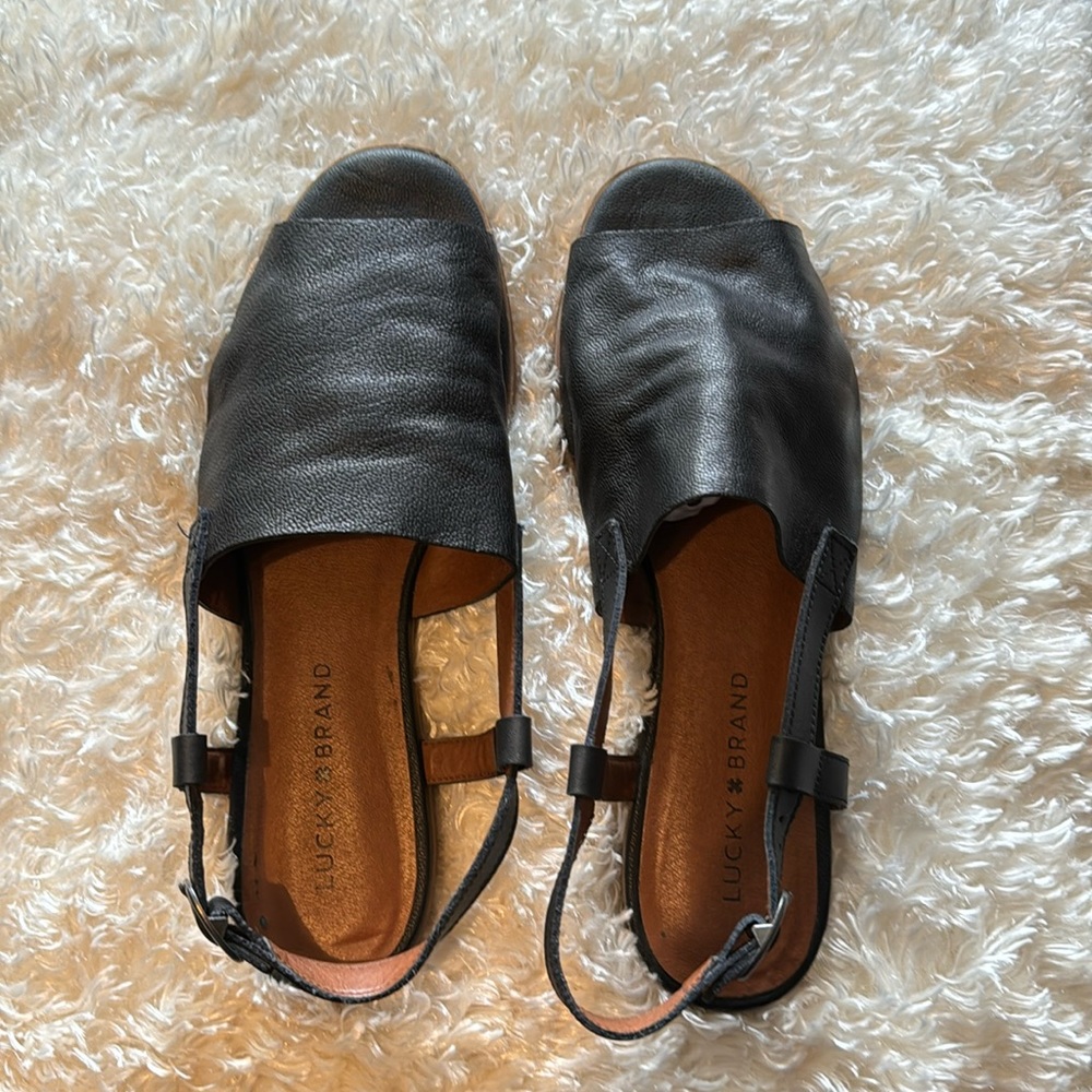 Black sling- back flat sandals